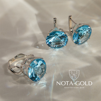 Комплект серьги и кольцо из белого золота с топазами (Вес: 8 гр.)