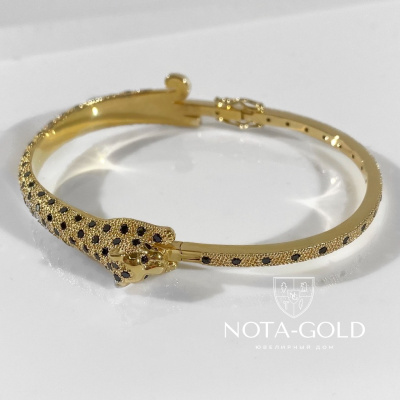 Жесткий браслет скоба Ягуар из желтого золота с черными бриллантами (Вес 24,5 гр.)