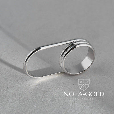 Тонкое кольцо необычной формы из белого золота (Вес 7 гр.)