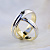 Двухцветные обручальные кольца с бриллиантом в виде складки шёлковой ткани (Вес пары: 10 гр.)