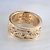 Женское золотое кольцо на заказ из красного золота с бриллиантами, ангелами, гравировкой и вращающимся центром (Вес: 16,5 гр.)