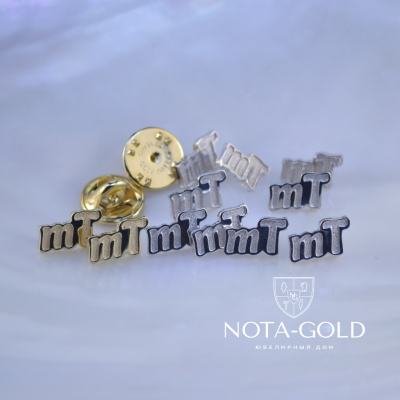 Партия значков из серебра и золота для компании