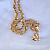 Кулон-подвеска в виде боксёрской перчатки из красного золота на цепочке плетение Гачи (Вес: 48,5 гр.)
