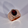 Женский перстень из красного золота с крупным гранатом (Вес 10,5 гр.)