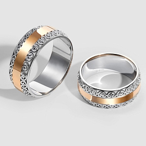 Обручальные кольца из двух видов золота с ажурным рисунком (Вес пары 11 гр.)