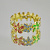 Женское кольцо в виде переплетения разноцветных бутонов цветков (Вес: 3 гр.)