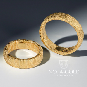 Полновесные волнистые обручальные кольца из желтого золота (Вес пары 18,6 гр.)