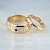 Обручальные кольца из красного золота с гравировкой даты свадьбы, бриллиантами, рубином и сафиром (Вес пары: 13 гр.)