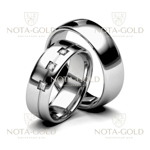 Широкие глянцевые платиновые обручальные кольца с тремя бриллиантами в женском кольце (Вес пары: 22 гр.)