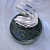 Корпоративный серебряный сувенир в виде знака бесконечности на каменной подставке из змеевика (Вес: 149 гр.)