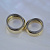 Именные обручальные кольца из жёлтого золота с кольцами внутри и чёрного золота (Вес пары: 20 гр.)