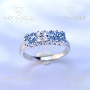 Женское золотое кольцо из белого золота с топазами и бриллиантами (Вес: 5,5 гр.)