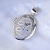 Кулон-медальон из серебра с двумя фотографиями и инициалами супругов (Вес: 30 гр.)