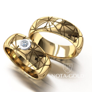 Обручальные кольца Матрица из жёлтого золота с бриллиантом и рисунком (Вес пары 16,5 гр.)