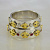 Обручальные кольца с лилиями из белого золота с бриллиантами и гранатами (Вес пары: 16 гр.)