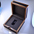 Подарочная ювелирная коробка для украшения из дерева сапеле и кожи питона с золотой вставкой на крышке