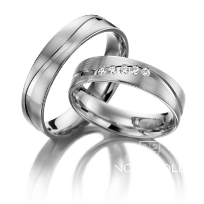 Широкие платиновые обручальные кольца с волной и бриллиантами в женском кольце (Вес пары: 18 гр.)