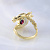 Золотое кольцо из жёлтого золота с драгоценным камнем, змеей и цветком (Вес: 15,5 гр.)