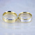 Двухцветные жёлто-белые обручальные кольца с бриллиантом в женском кольце (Вес пары: 16,5 гр.)