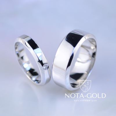 Обручальные кольца из белого золота с бриллиантом в женском кольце (Вес пары: 12 гр.)