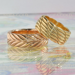 Парные свадебные кольца с косичками и листочками в двух оттенках золота (Вес пары: 22 гр.) 