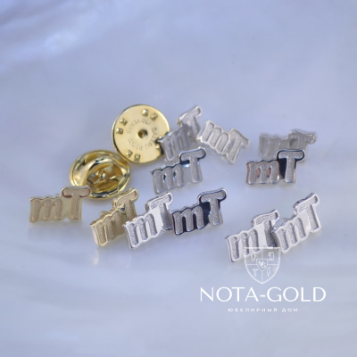 Партия значков из серебра и золота для компании