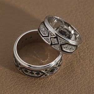 Обручальные кольца из белого золота с бриллиантами и черной эмалью (Вес пары 13 гр.)