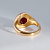 Кольцо из желтого золота с крупным гладким рубином и бриллиантами (Вес 11 гр.)
