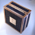 Подарочная ювелирная коробка для украшения из дерева сапеле и кожи питона с золотой вставкой на крышке