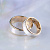 Обручальные кольца из красно-белого золота с гравировкой имен супругов (Вес пары 17,5 гр.)